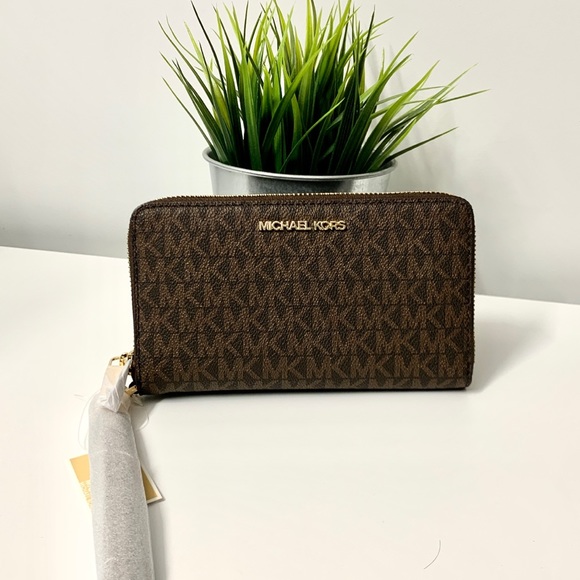 Michael Kors Handbags - BNWT MICHAEL KORS MONOGRAM BROWN PHONE WALLET/WRISTLET -LEATHER WITH CARD SLOTS